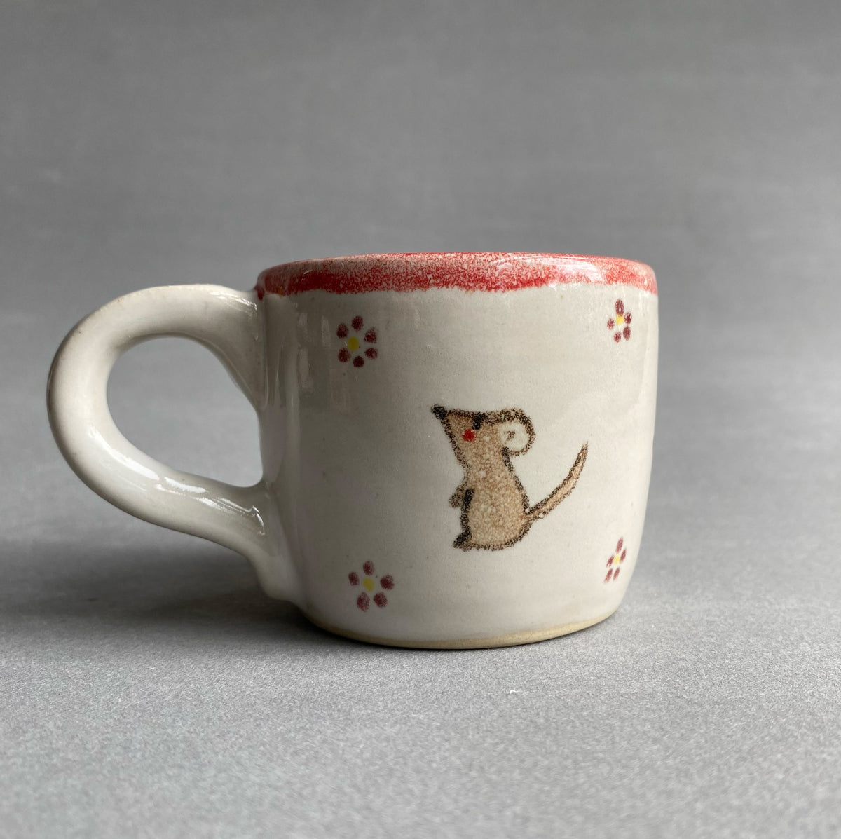 Tasse mit Tierchen