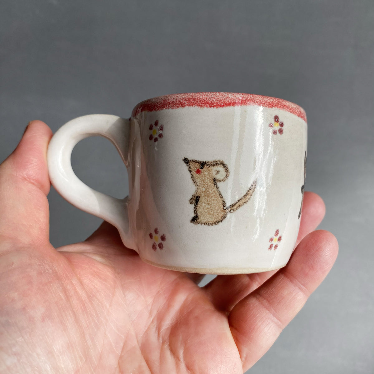 Tasse mit Tierchen
