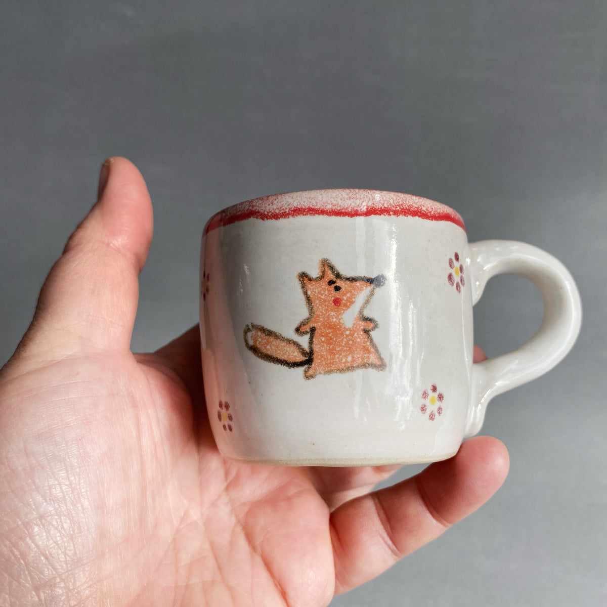 Tasse mit Tierchen